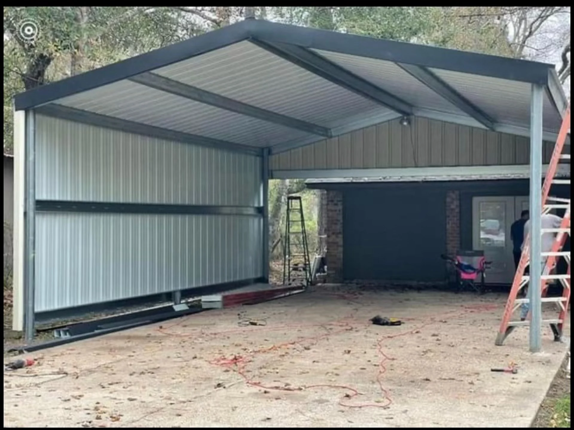 Custom residential metal carport with a gabled roof